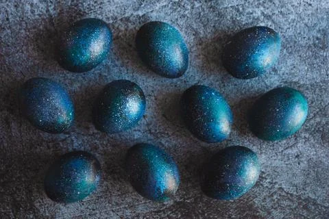 Dark galaxy easter eggs hand made blue Stock Photos