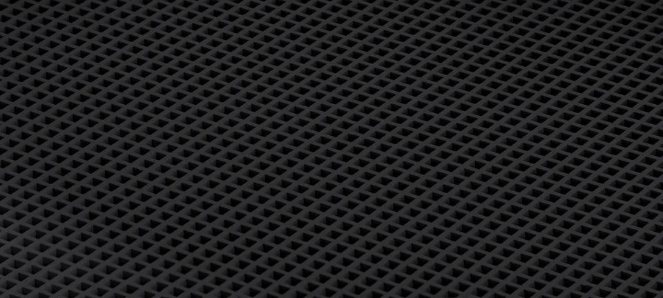 Dark geometric grid pattern creating abstract texture Stock Photos