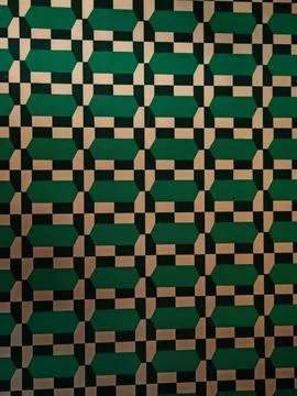 Dark geometric wall pattern in muted green beige and black tones Stock Photos