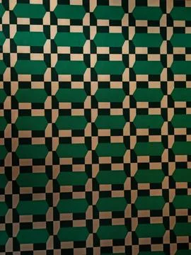 Dark geometric wall pattern in muted green beige and black tones Stock Photos
