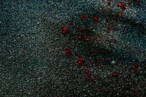 Dark glitter texture with red sparkles Stock Photos