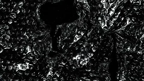 Dark Glossy Bubble Wrap Plastic Texture with Transparent Wrinkled Packaging Stock Footage 339028806
