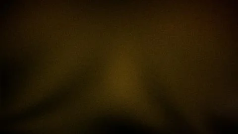 Dark golden gradient background with subtle brown hues and a grainy texture.. Illustrazione stock