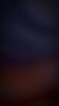 Dark gradient background with black navy and brown color grainy blur vertic.. Stock Photos
