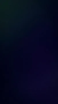 Dark gradient background with green blue and purple vertical grainy tech te.. Stock Photos
