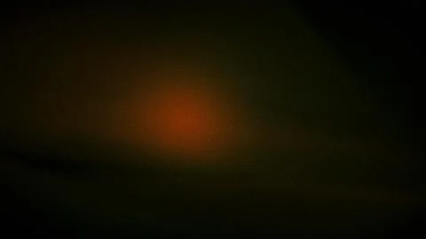 Dark gradient background with a subtle warm orange glow in the center, feat.. Stock-Illustration