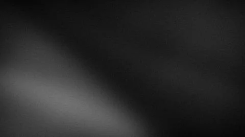 Dark gradient black and gray grainy textured background with abstract blur .. Stock Photos
