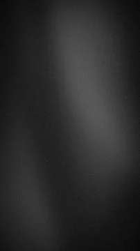 Dark gradient black gray grainy background texture vertical format abstract.. Stock Photos