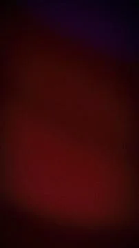Dark grainy abstract background with red brown and dark purple gradients ve.. Stock Photos
