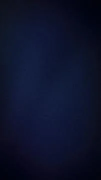 Dark grainy gradient background with blue navy and black shades vertical ab.. Stock Photos
