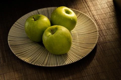 Dark granny smith apples Stock Photos