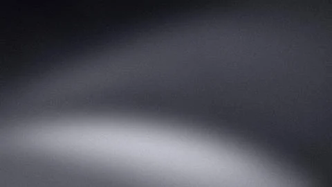 Dark gray and light gray abstract gradient background with grainy texture f.. Stock Photos