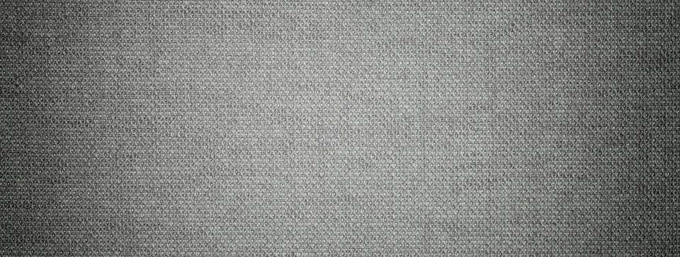 Dark gray background from a textile material with wicker pattern, closeup. St 스톡 사진
