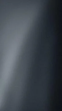 Dark gray blue smooth gradient grainy vertical texture background for tech .. Stock Photos