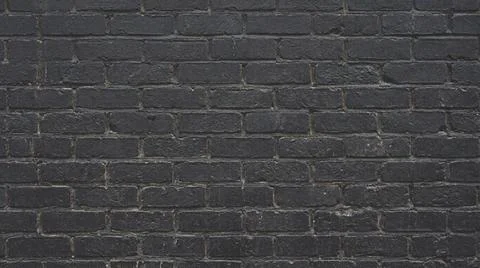 Dark gray brick wall background texture. Fotos Stock