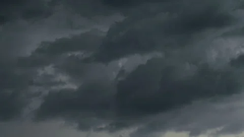 Dark gray clouds covering the sky before rain. Timelapse Stock Footage 330518984