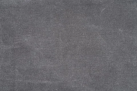 Dark gray denim fabric texture background Stock Photos