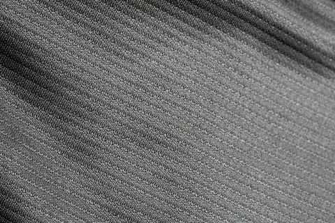 Dark gray fabric micro texture background for product presentation Stock Photos