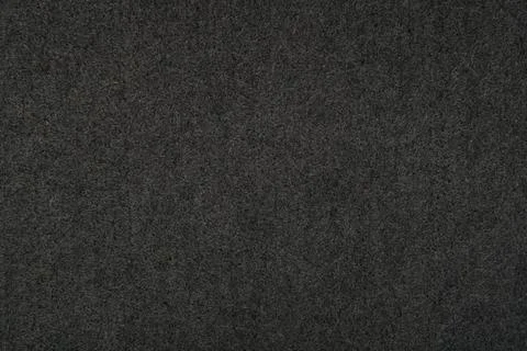 Dark gray felt texture background - close-up of soft fabric surface. Stock Photos
