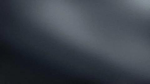 Dark gray gradient grainy background blur abstract texture wallpaper with 4.. Stock Photos