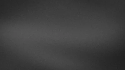 Dark gray grainy gradient abstract background 4K texture with blur grunge e.. Stock Photos