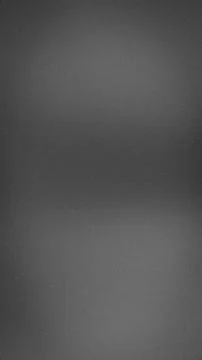 Dark gray grainy texture background vertical format abstract gradient tech .. Stock Photos