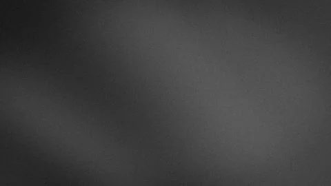 Dark gray grainy texture background with black and light gray gradient in 4.. Stock Photos