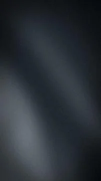 Dark gray grainy vertical abstract background wallpaper with black and fade.. Stock Photos