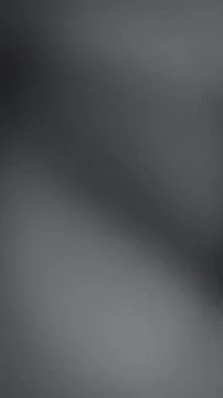 Dark gray grainy vertical background with smooth gradient blur texture for .. Stock Photos