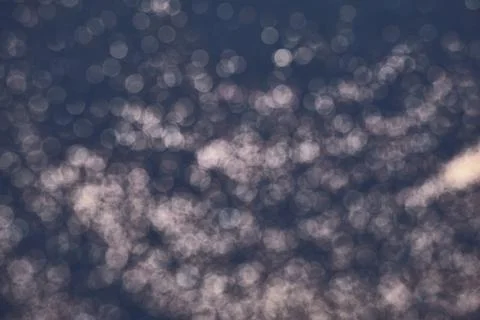 Dark gray grunge background texture with bokeh. Film overlay effect Stock Photos