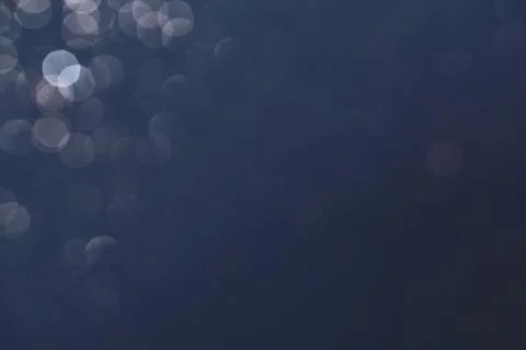 Dark gray grunge background texture with bokeh. Film overlay effect 写真素材