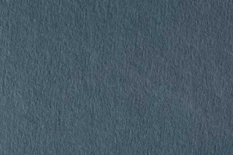 Dark gray paper texture background on macro. Stock Photos