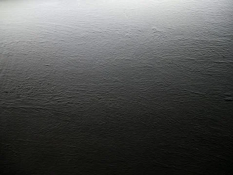 Dark gray rough gradient concrete background Stock Photos