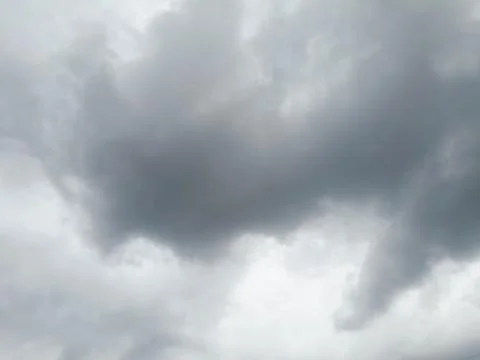 Dark gray storm clouds fill the sky, Stock Photos