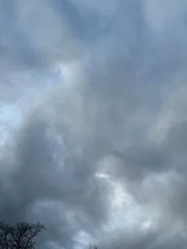 Dark Gray Storm Clouds Vertical Background Stock-Fotos