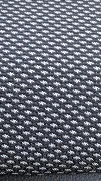 Dark gray technical mesh fabric texture close up Stock Photos