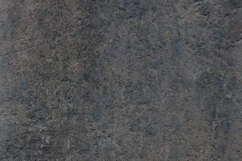 Dark gray texture of the concrete wall of the building, background. Stock Photos
