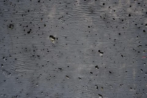 A dark gray textured concrete surface Фото