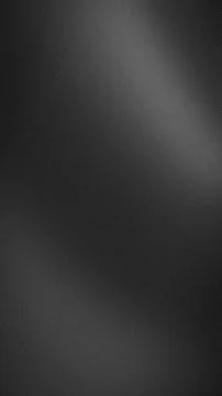 Dark gray textured gradient abstract background with grainy vertical backdr.. Stock Photos