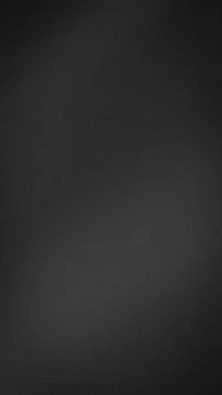 Dark gray textured vertical background with grainy blur gradient tech grung.. Stock Photos