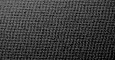 Dark gray woven fabric texture with fine threads and gentle shading Stock Footage 344987691
