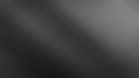 Dark grayscale gradient background with grainy texture blur abstract design.. Stock Photos