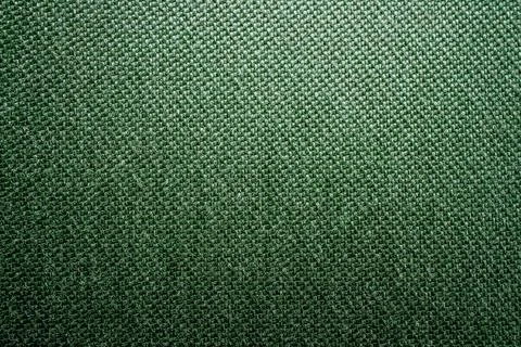 Dark green background of textile material with wicker pattern, close up. The  Stock Photos