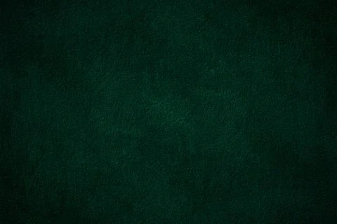 Dark green color solid textured cement plaster wall surface for background Stock Photos