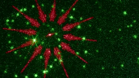 On a dark green fine-grained gradient background, moving multi-colored figures Stock Footage 240523292