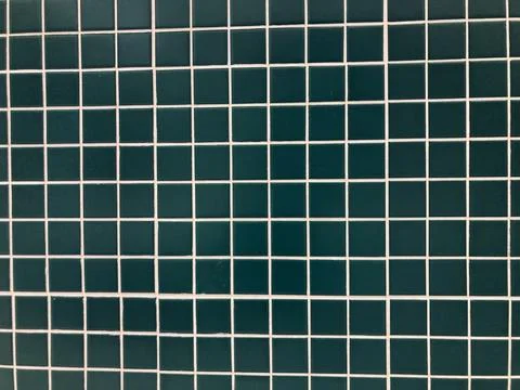 Dark green geometric shape tile and white line wall Stock-Fotos