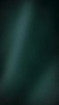 Dark green grainy abstract gradient background vertical texture wallpaper w.. Foto stock