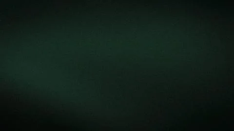 Dark green grainy texture background with subtle gradient abstract blur for.. Stock Photos
