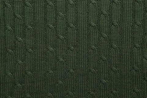 Dark green knitted wool texture as background, top view Stock Photos