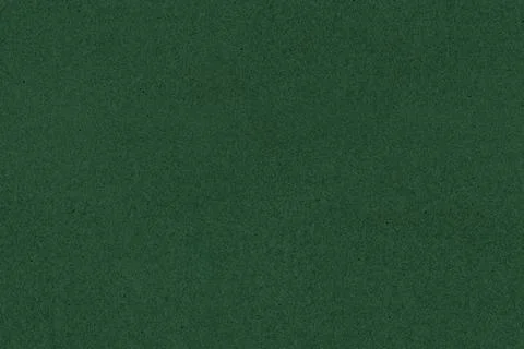 Dark green paper texture background. Deep green seamless recycled cardboard. Фото